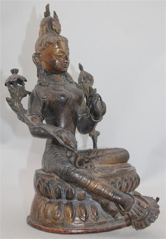 A Sino-Tibetan bronze seated figure of Green Tara, 30cm